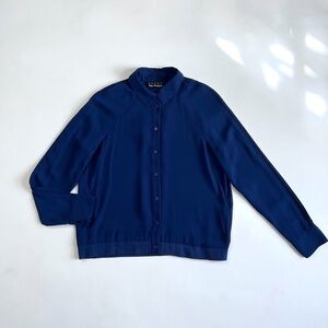 The Koople Sport Semi-Sheer Button Down Blouse